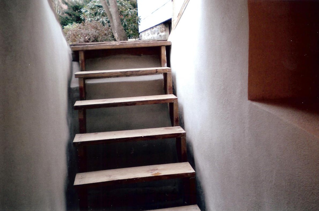 Smooth white re-cemented basement wall
